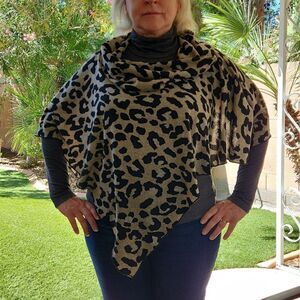 Poncho style animal print tunic/shawl by Laura's Boutique. One size fits all.